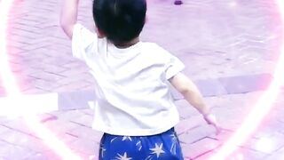 Twin baby fun time in the street