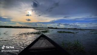 The boat sky in the village of Bangladesh is very beautiful