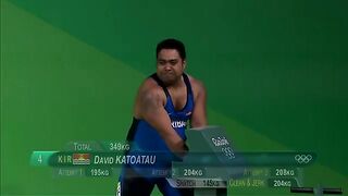 Katoatau fails his last weightlifting attempt but celebrates with a dance
