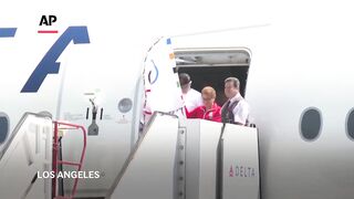 Olympic flag returns to Los Angeles for first time in 40 years.