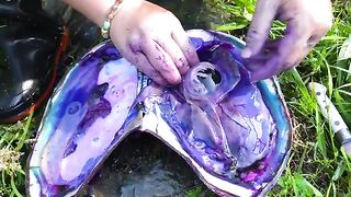 The girl opened a giant clam, filled with precious pearls, so beautiful that it was intoxicating
