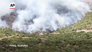 Firefighters battle flames in parts of Albania.