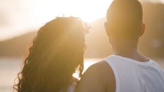 couple contemplating the sunset