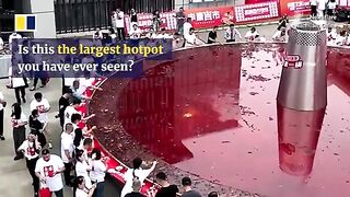 Hundreds of diners in China enjoy ‘world’s largest spicy hotpot’