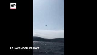Plane crashes into the sea during an air show in France.
