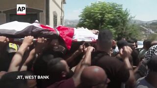 Hundreds attend funeral of Palestinian man killed by Israeli settlers in West Bank.
