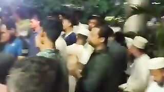 The police station was surrounded by the general public