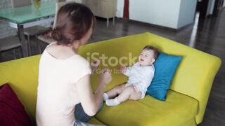 mommy and baby playing