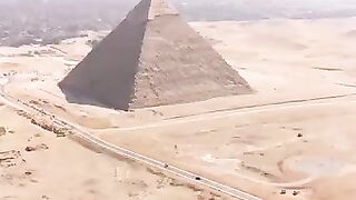 Wingsuit Flying Over The Pyramids in Giza