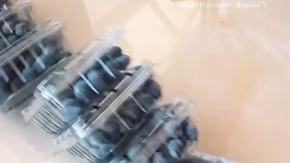 Arabic lady making berry juice ????