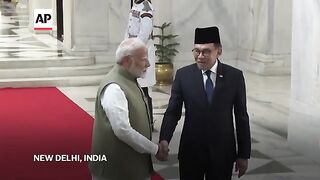 India's Narendra Modi welcomes Malaysian counterpart Anwar Ibrahim in New