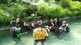 Playing in the water with my mother in the tumpang valley