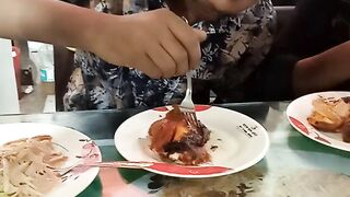 Giril food party with younger brothers