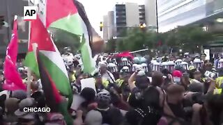 At least 55 arrested after clashes with Chicago police during the DNC
