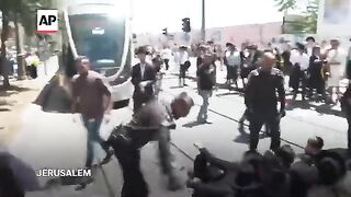 Orthodox Jewish protesters against military service law forcibly removed by police in Jerusalem