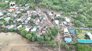 At least 11 die in flash flood in eastern Indonesia.