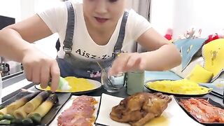 husband and wife eating food eating mukbang