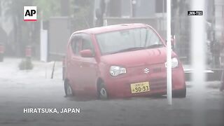 Heavy rain floods roads and disrupts transport in Japan.