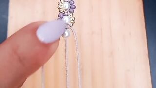 Purple_Seed_Beaded_Hoop_Earrings_[Video]_in_2024___Handmade_jewelry_tutorials,_Bracelets_handmade_beaded,_Bead_jewellery(240P). 2