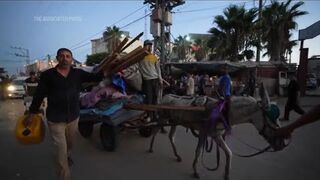 Displaced Palestinians flee area around hospital in Gaza after evacuation order by Israeli military