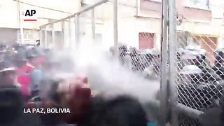 Police fire teargas during clashes with protesters in Bolivia over economy