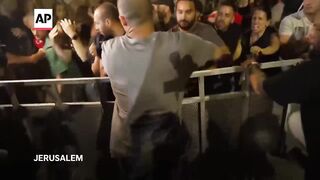 Thousands gather outside Netanyahu’s home in Jerusalem.