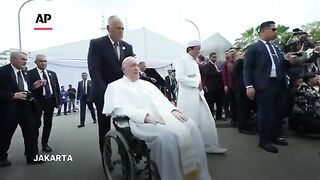 Pope kisses hand of Jakarta mosque's grand imam after interfaith meet in Indonesia