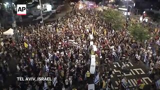 Tel Aviv protesters carrying mock coffins demand a deal to release hostages held in Gaza