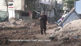 Resident reacts to destruction in the West Bank after Israeli raids
