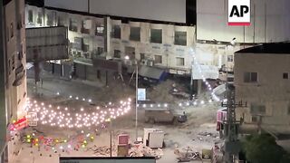 Clashes erupt between Palestinian protesters and Israeli soldiers in the city centre of Jenin