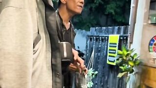 busker with a melodious voice singing a song "country roud"