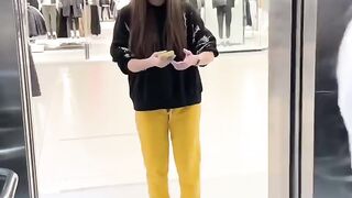 A girl touched bodybuilder in the mall