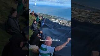 Activists unfurl giant Palestinian flag at top of Northern Ireland hill
