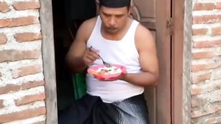 It's a pity to see that the person eating is hungry. It's the stomach