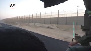 Israeli military video shows troops and strikes on Hamas positions in Gaza.