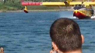 Public Waving at the Canadair CL-415 Super Scooper Pilots