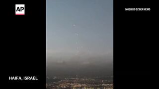 Israel's Iron Dome intercepts missiles fired from Lebanon over Haifa.