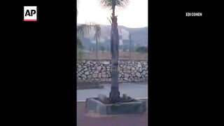 Video appears to show rockets land in Rosh Pina, Israel; others intercepted.