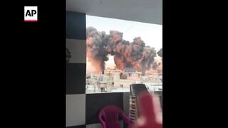 Video shows explosions in Beirut as Israel says it struck Hezbollah HQ.