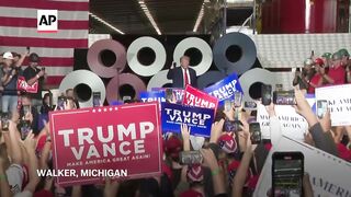 Trump attacks Harris on immigration during Michigan campaign stop.