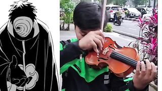 Pria memainkan alat musik,dengan sound obito sungguh orang yang sempurna