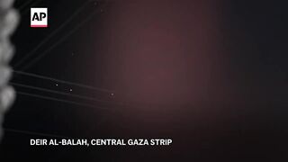 Gazans celebrate as skies over Israel flooded with missiles from Iran.