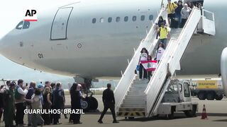 Plane carrying Brazilians fleeing Lebanon lands in Brazil.