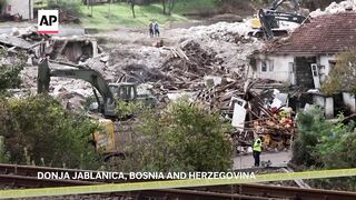 Search for those missing after flash floods hit parts of Bosnia, killing at least 16.