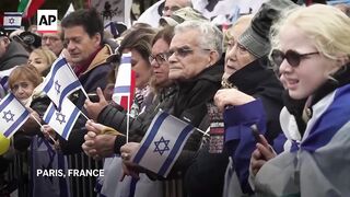 Thousands gather in Paris to pay tribute to October 7 victims ahead of anniversary.