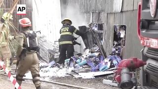 Aftermath of rocket attack on central Israel's Kfar Habad.