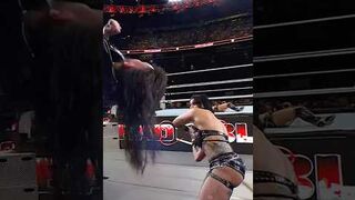 Rhea Ripley takes out the human piñata Dirty Dom