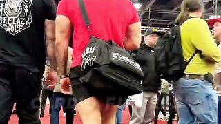 "Public reaction to bodybuilder at the mall."