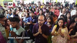 Hindus in Bangladesh celebrate their largest festival under tight security following attacks.