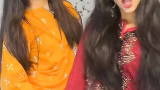Two sisters dancing a indian song